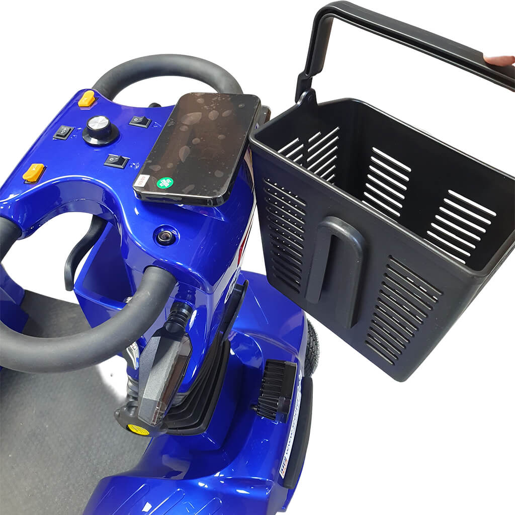 L30_blue_04 | EcoWay Скутери Blue mobility scooter cockpit with a black front basket and a smartphone resting on the control panel.